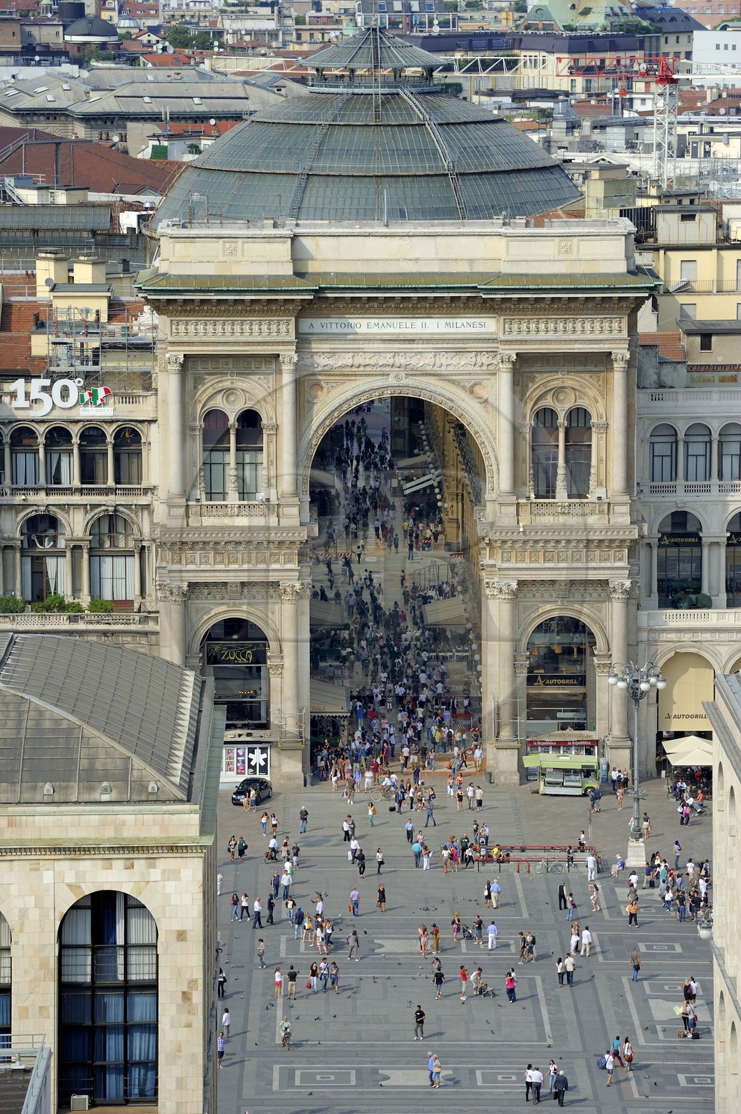 Italy, Lombardy, Milan, Piazza del Duomo and the entry of Vittorio Emmanuel II gallery, shopping arcade built on the 19th century by Giuseppe Mengoni