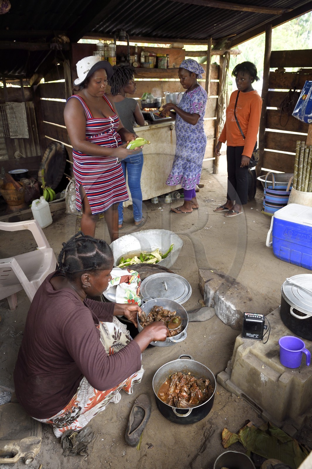 Gabon, Ogooue-Maritime Province, Omboue, Loango region, preparing food in the kitchen