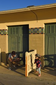 France, Calvados, Pays d'Auge, Deauville, the famous planks on the beach, lined with Art Deco style bathing cabins, each with the name of a celebrity who participated in the Deauville American Film Festival