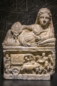 France, Gard, Nimes, Romanity museum (Musée de la Romanite), Etruscan cinerary urn in alabaster representing the journey of a couple of the deceased on a chariot (Volterra 1st century BC)(temporary exhibition)
