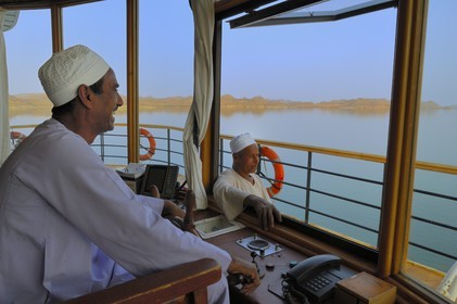Egypt, Upper Egypt, Nubia, Lake Nasser, lake cruise on Qasr Ibrim ship, the cockpit and the captain