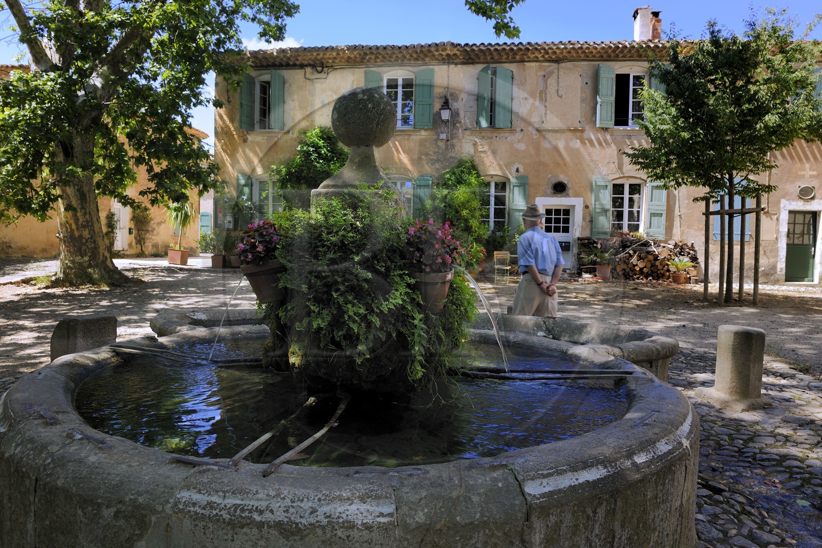 France, Herault, Villeneuvette, former Royal factory, the fountain on the place Louis XIV set up for the washerwomen