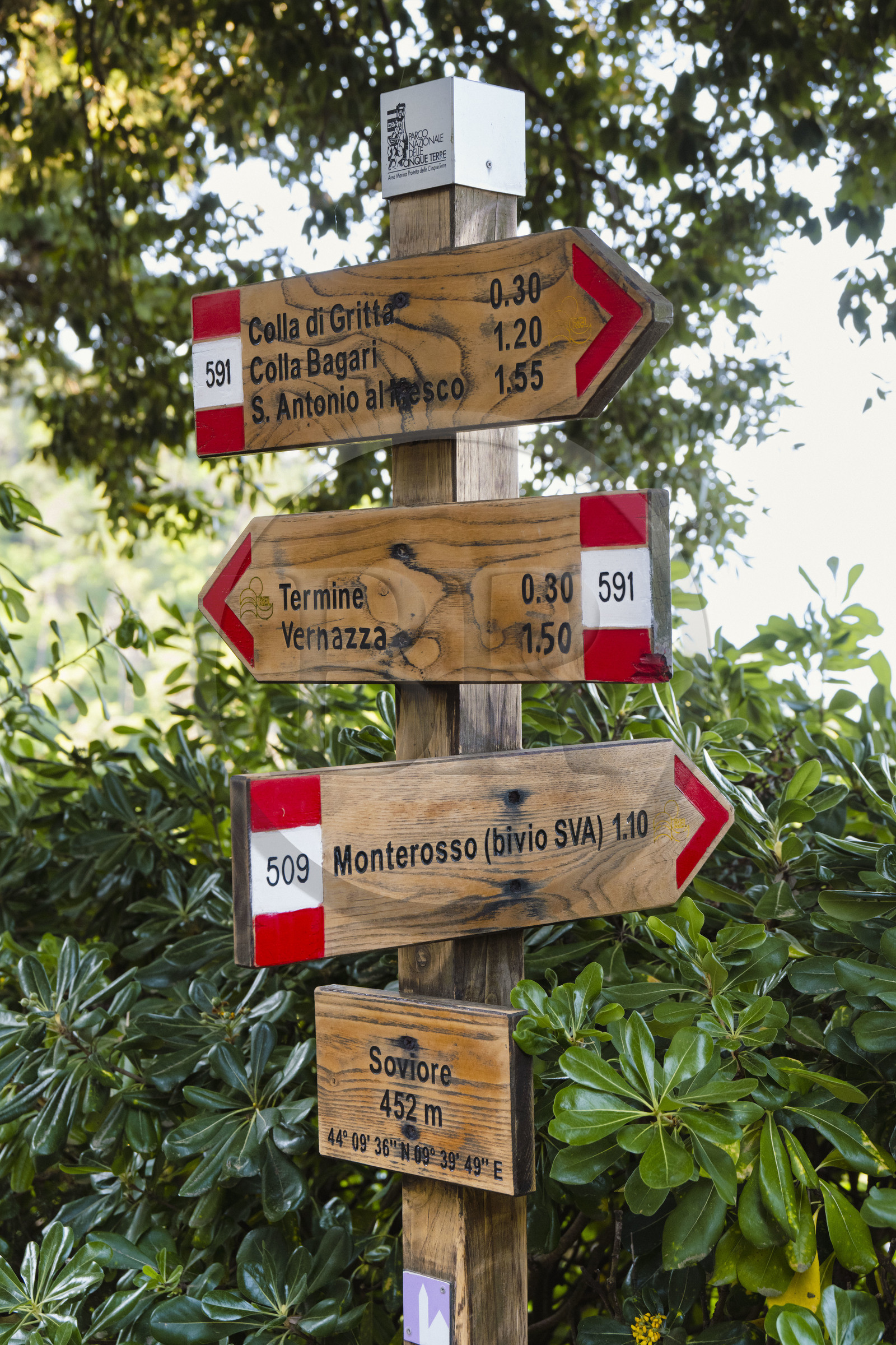 Italy, Liguria, Cinque Terre National Park listed as World Heritage by UNESCO, village of Monterosso al Mare, sign indicating the various hiking trails starting from the sanctuary of Nostra Signora de Soviore