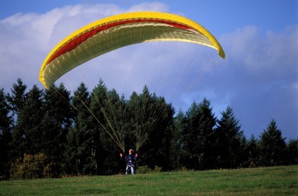 France, Saone et Loire, Autun region, landing of a paraglider