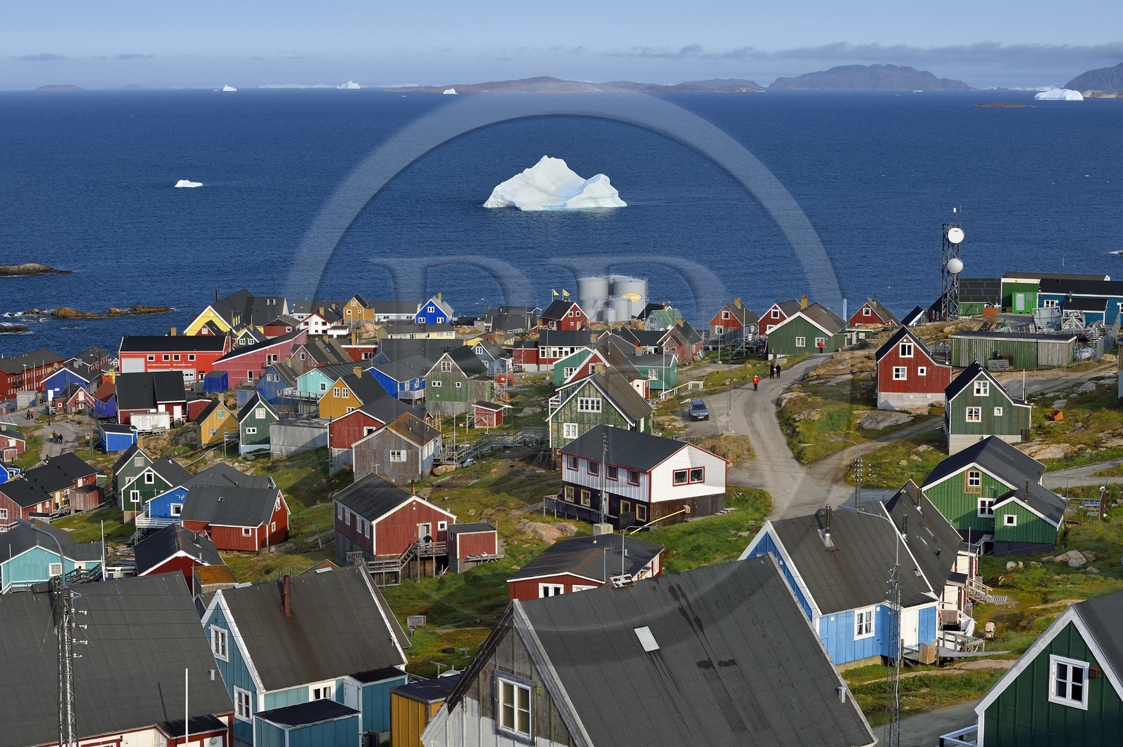 Greenland, west coast, Baffin Bay, the town of Upernavik and icebergs in the background