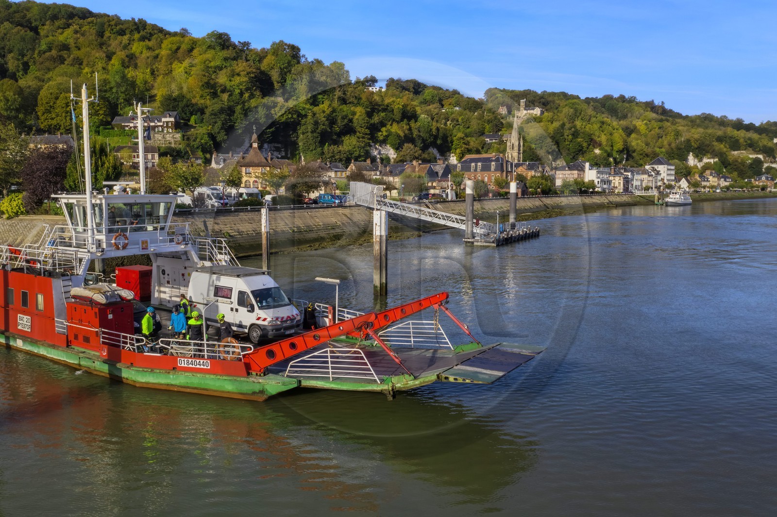 France, Seine-Maritime, Norman Seine River Meanders Regional Nature Park, the ferry crossing the Seine river at the village of La Bouille (aerial view)