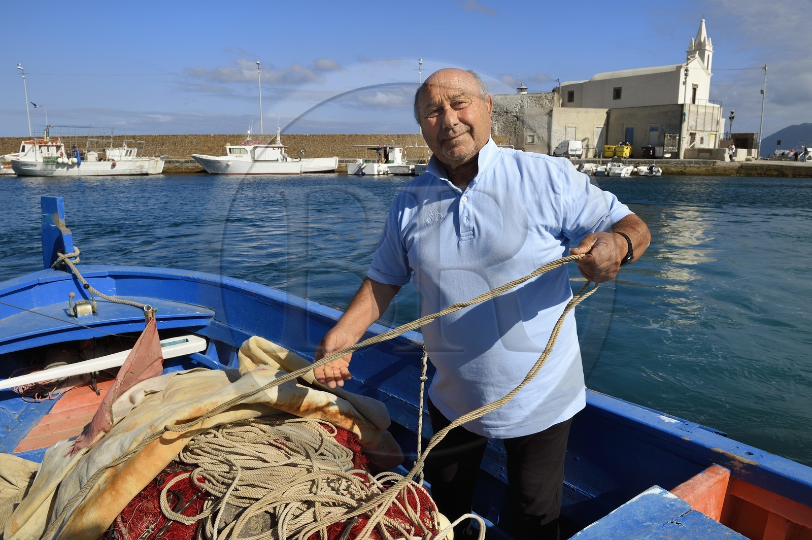 Italy, Sicily, Aeolian Islands, listed as World Heritage by UNESCO, Lipari Island, Lipari, Marina Corta fishing port, the fisherman Enzo Tomarchio says Enzo Il Negro