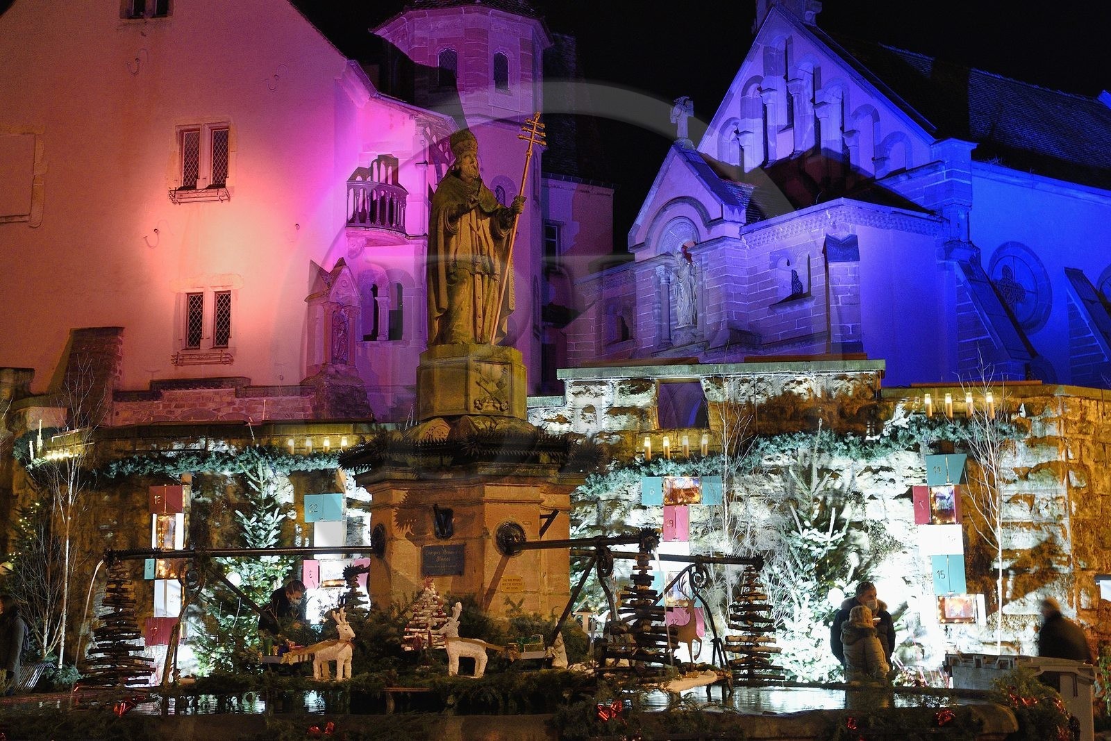 France, Haut Rhin, Eguisheim, labelized Les Plus Beaux Villages de France (the Most Beautiful Villages of France), the Saint-Léon fountain on the Place du Chateau, Christmas lights and decorations