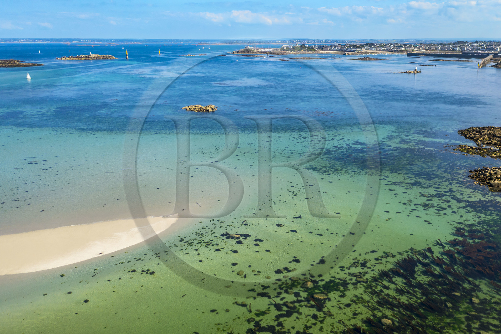 France, Finistère, Ponant Islands, Ile de Batz (Batz Island), Porz verc'h beach at Pointe de Penn-Batz and Roscoff in the background (aerial view)