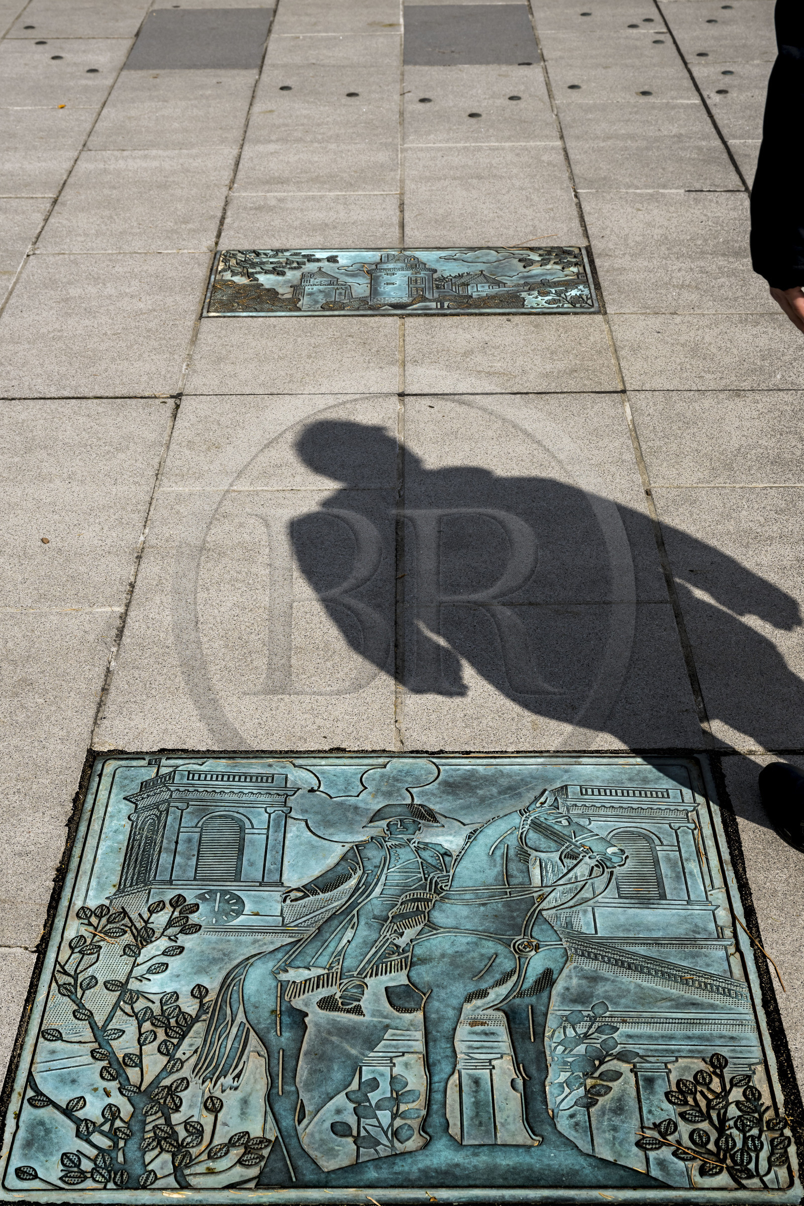 France, Vendee, La Roche-sur-Yon, place de la Vendée, one of the twenty bronze plaques designed by the Macheret art foundry and representing each of the twenty intercommunalities of the department, here Napoléon Bonaparte for La Roche-sur-Yon