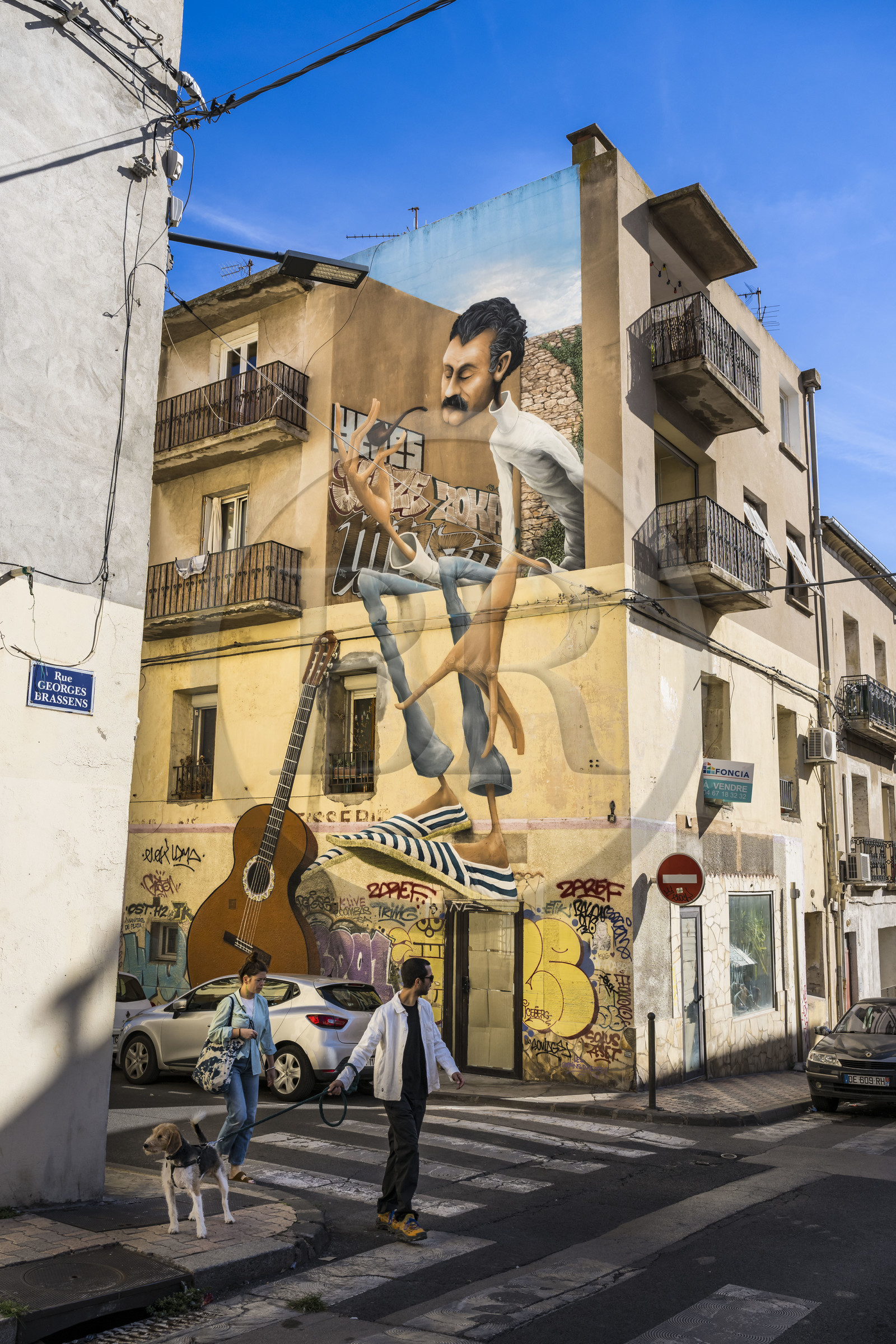 France, Herault, Sete, fresco which is part of the MACO (Musee à ciel ouvert) - Open-air museum, mural tribute to Georges Brassens and work by the artist Maye at the corner of rue de la Revolution and rue Georges Brassens