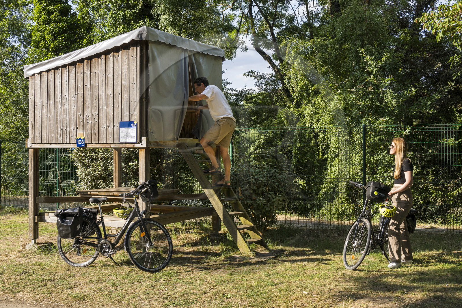 France, Maine-et-Loire, Loire valley listed as World Heritage by UNESCO, Saumur, Flower Camping l'Ile d'Offard, elevated tent, accommodation for cyclists