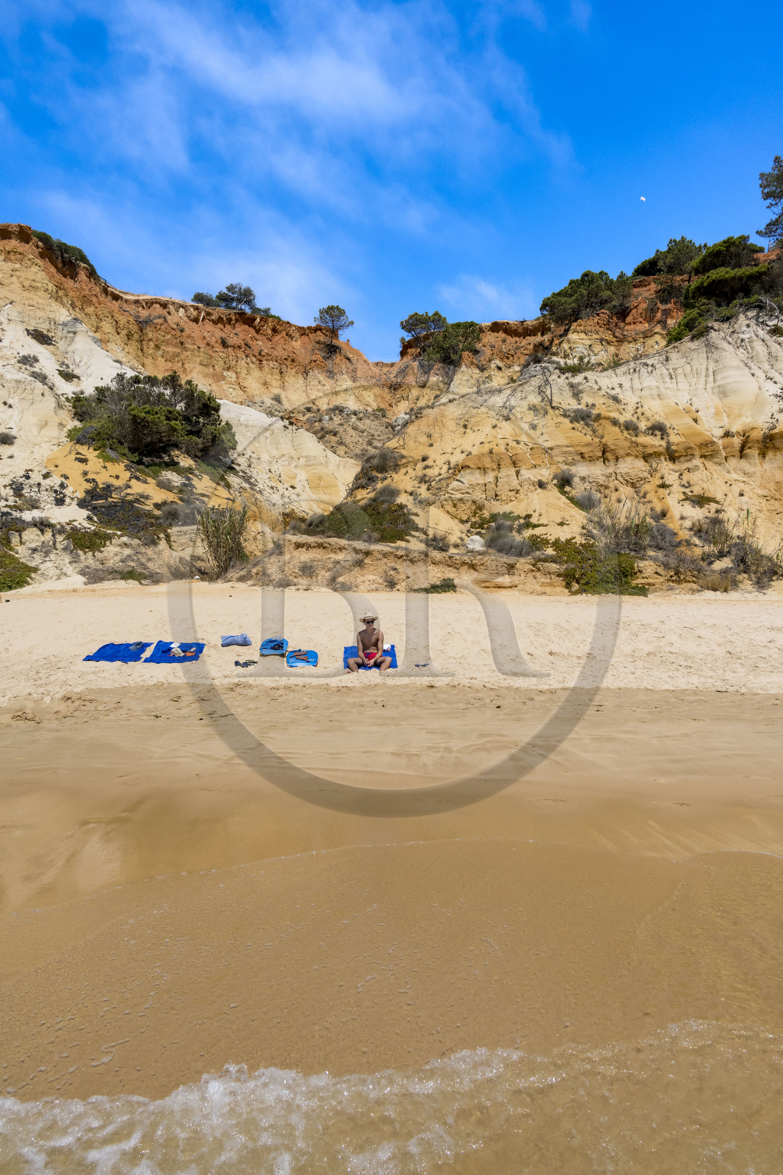 Portugal, Algarve, Olhos de Agua, the beach of Praia da Falésia overlooked by its red cliffs
