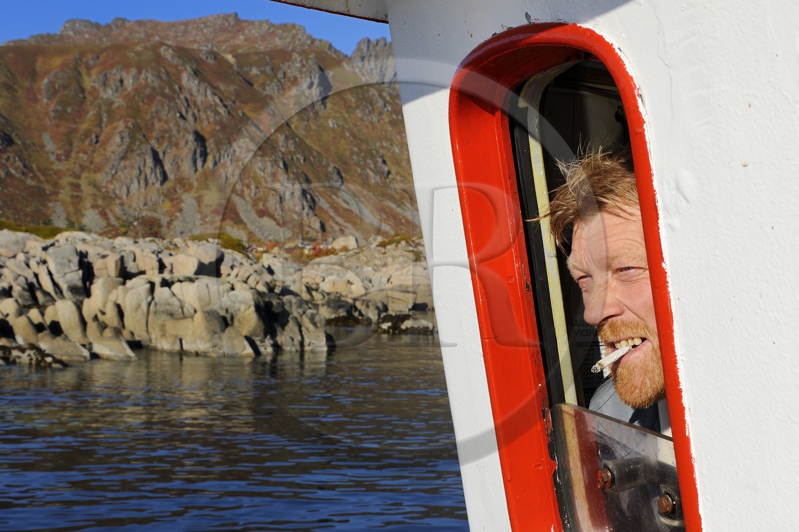 Norway, Nordland County, Lofoten Islands, departure of the boat for fishing, fisherman