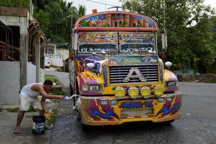 Panama, Colon province, Portobelo, bus called Diablo Rojo (Red Devil) covered with garish paintings