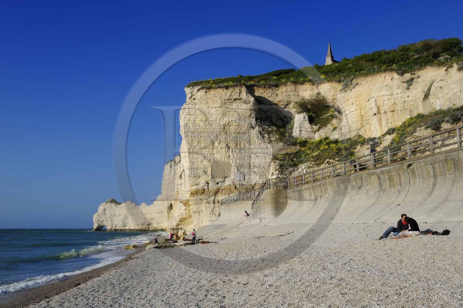 France, Seine-Maritime, Pays de Caux, Cote d'Albatre, Etretat, Amont cliff and Notre-Dame-de-la-Garde church seen from the beach of the town