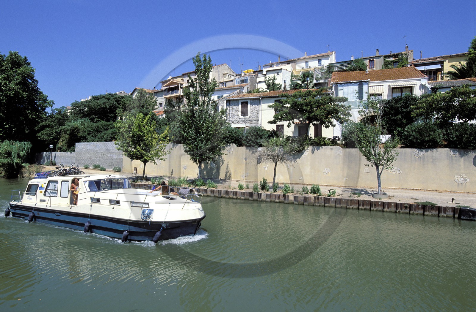 France, Aude, barge on the Canal du Midi, Paraza village next to Lezignan Corbieres