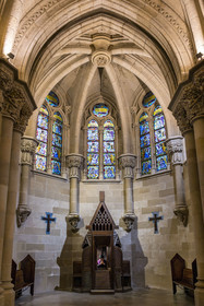 Spain, Catalonia, Barcelona, Eixample district, Sagrada Familia basilica by Catalan modernist architect Antoni Gaudi, listed as a UNESCO World Heritage Site, the neo-Gothic style crypt serves as a parish church, furniture and liturgical objects designed by Gaudi, priest Joby Sebastian Kappiparambil in the confessional
