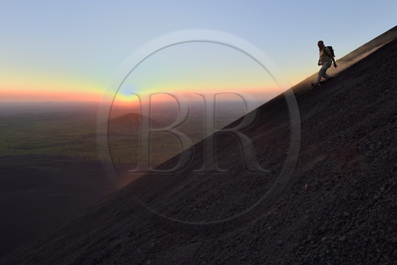 Nicaragua, Leon area, Volcan Cerro Negro in the Cordillera Maribios (or Marrabios), man running down volcano
