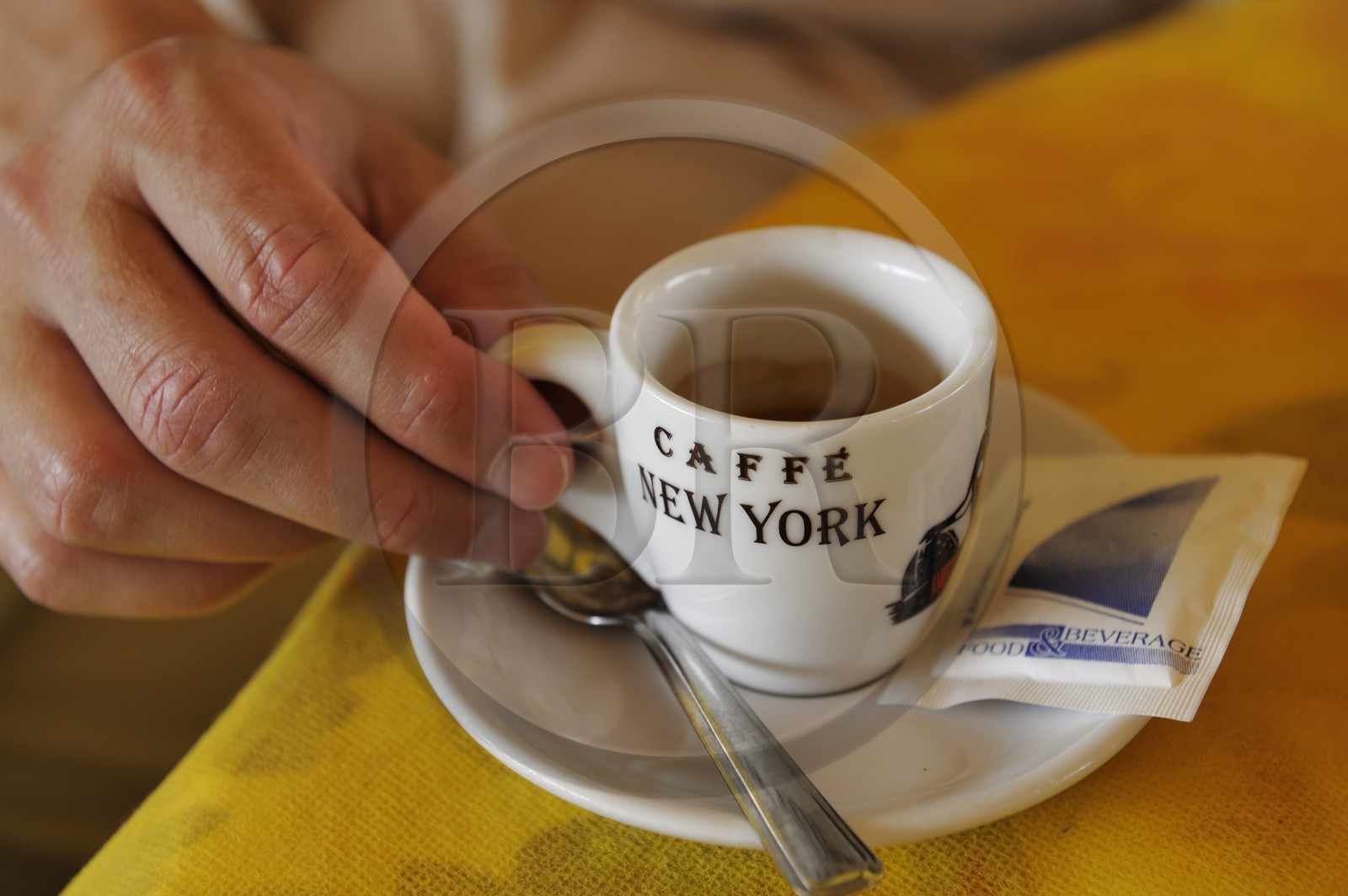 Italy, Tuscany, province of Lucca, seaside resort of Viareggio, cup of espresso in a cafe on the promenade Passeggiata