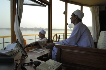 Egypt, Upper Egypt, Nubia, Lake Nasser, lake cruise on Qasr Ibrim ship, the cockpit and the captain