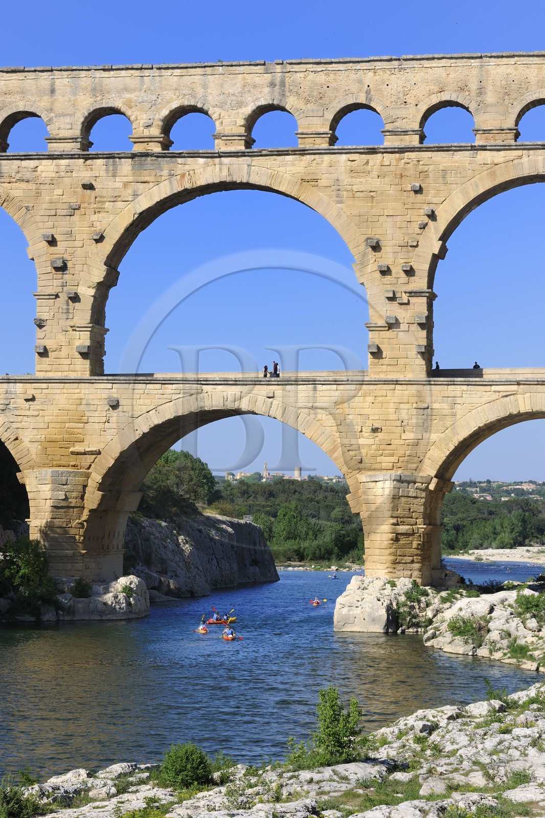 France, Gard, Pont du Gard listed as World Heritage by UNESCO, Roman aqueduct over Gardon River, canoeing