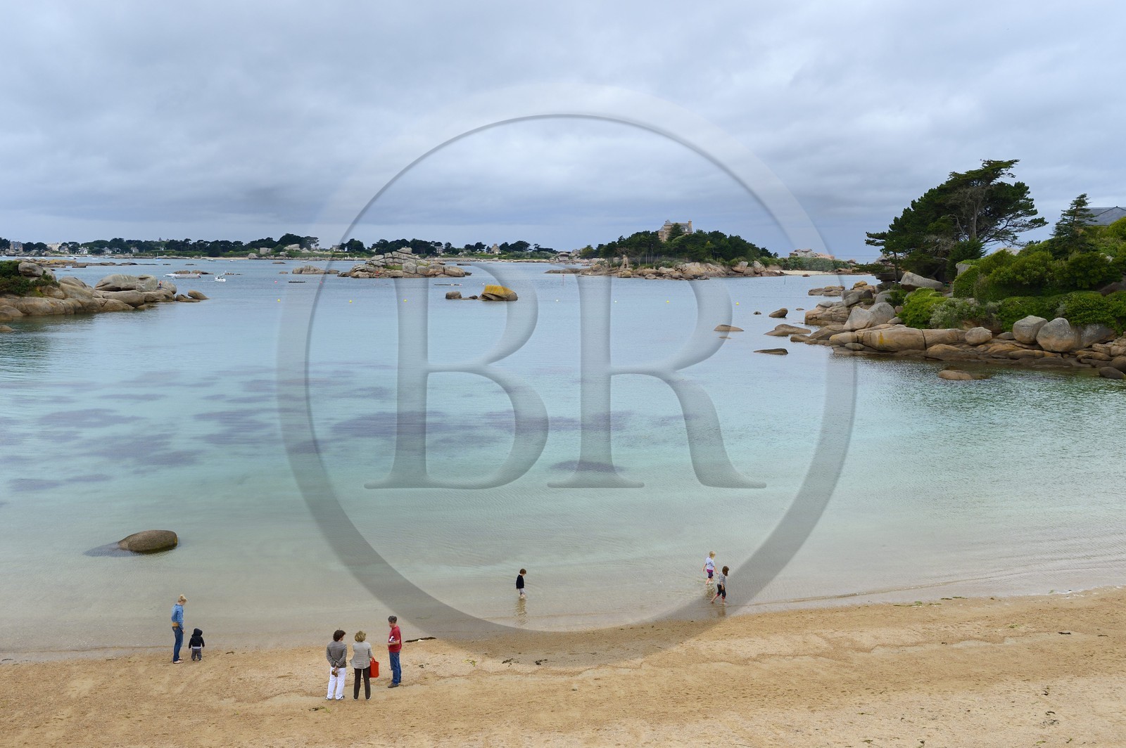 France, Cotes-d'Armor, Cote de Granit Rose (the Pink Granite coast), Tregastel, Costaeres castle and island behind St Guirec beach at Ploumanach, Renote island is in the background