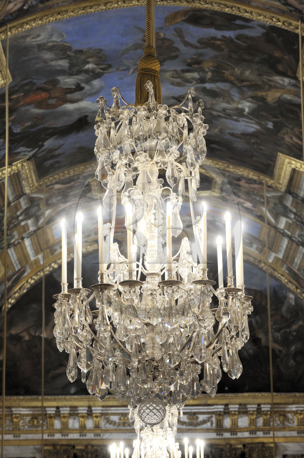 France, Yvelines, Chateau de Versailles, listed as World Heritage by UNESCO, Galerie des Glaces (Hall of Mirrors), architect Jules Hardouin Mansart (1678-1684), detail of a ceiling light