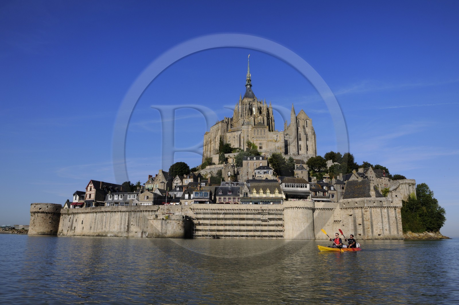 France, Manche, Mont Saint Michel, East side at high tide, listed as World Heritage by UNESCO, crossing the Bay of Mont Saint Michel in kayak