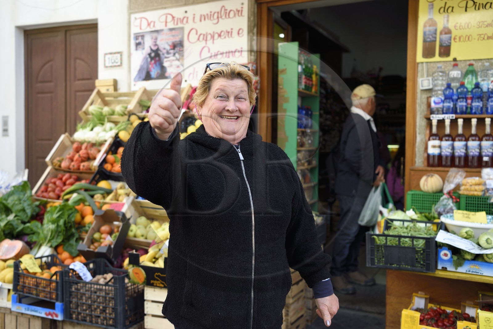 Italy, Sicily, Aeolian Islands, listed as World Heritage by UNESCO, Lipari Island, Lipari, Da Pina in front of her grocery store