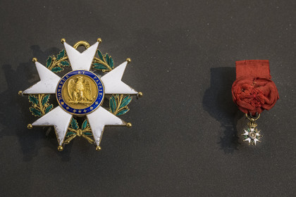 France, Seine-et-Marne, Fontainebleau, castle of Fontainebleau listed as World Heritage by UNESCO, Napoleon I Museum, large decoration of the Legion of Honor reputedly worn by Napoleon in Tilsit in 1807 on the left and officer's cross of the Legion of Honor worn by Napoleon in Saint Helena on the right