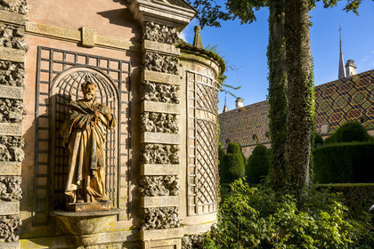 France, Cote d'Or, Beaune, area listed as World Heritage by UNESCO, Hospices de Beaune, Hotel Dieu, statue in the gardens