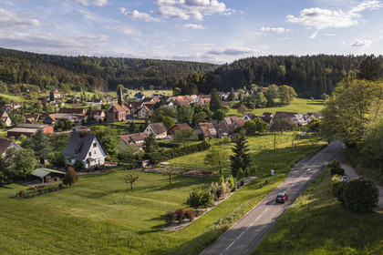France, Bas Rhin, Parc regional des Vosges du nord (Northern Vosges Regional Natural Park), Zittersheim, the departmental road D135 from La Petite Pierre at the exit of the forest (aerial view)