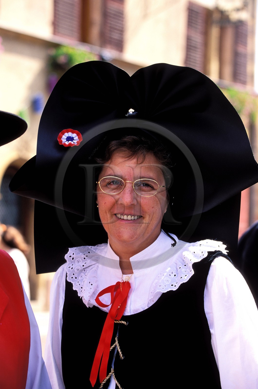 France, Haut Rhin, Eguisheim village, labelled Les Plus Beaux Villages de France (The Most Beautiful Villages of France), wine festival, woman in costume and head dress