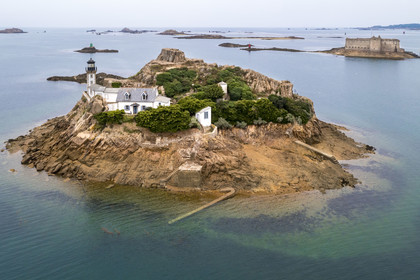 France, Finistère, Morlaix bay, Carantec, Louet Island and its lighthouse, the Taureau castle built by Vauban in the background (aerial view)