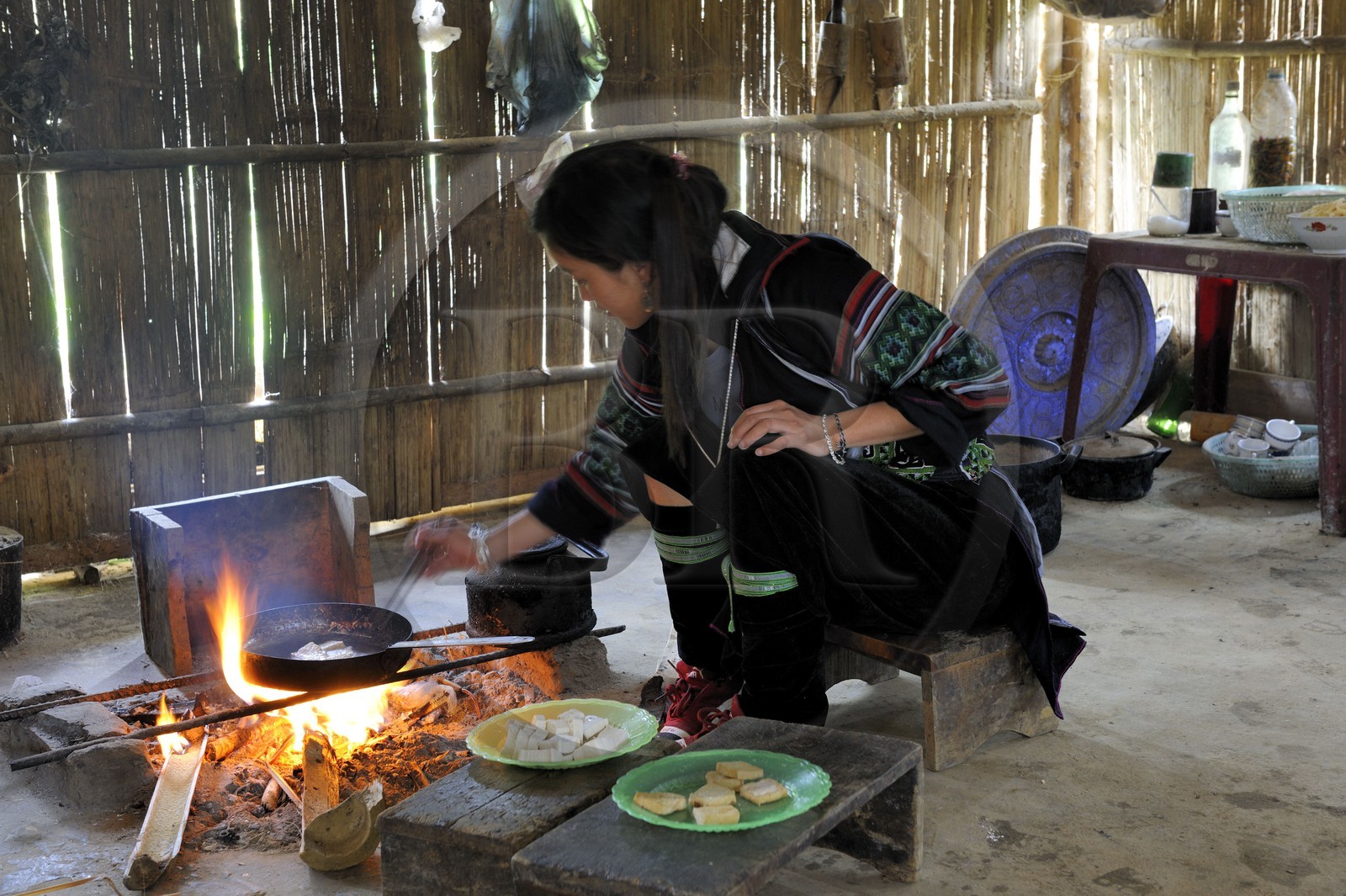 Vietnam, Lao Cai province, Sapa district, inside a house of a Black Hmong ethnic group, daily life in the kitchen cooking the Tofu