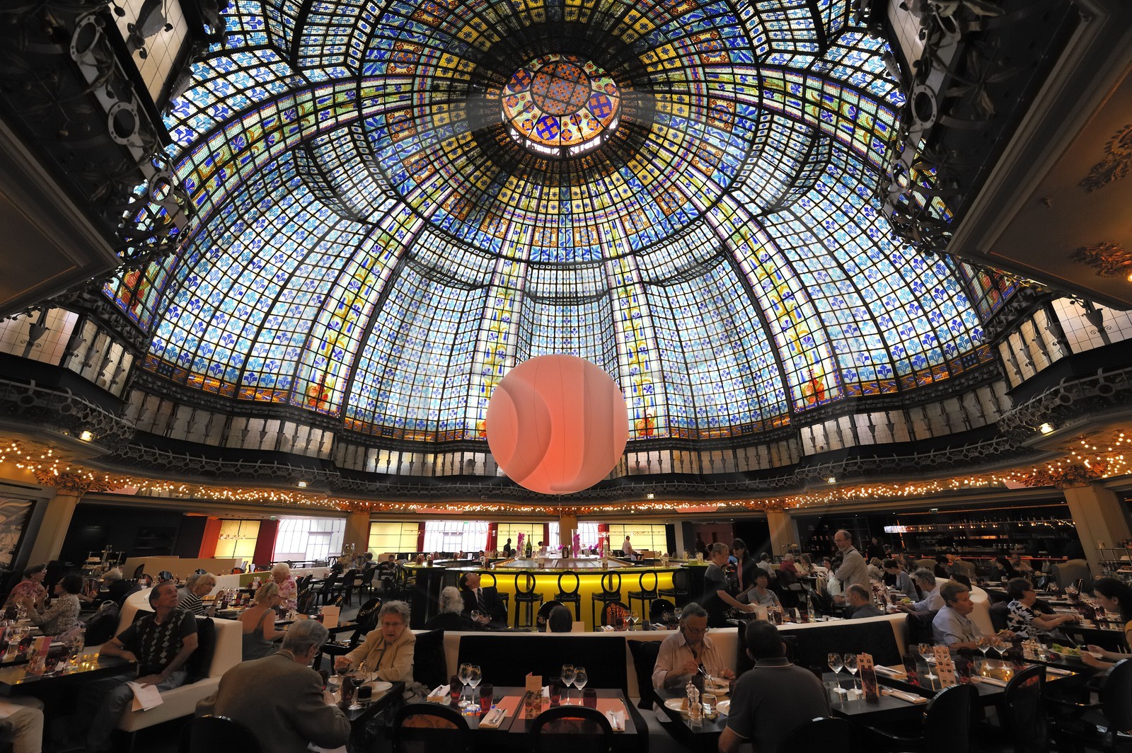 France, Paris, glass roof of the dome and the restaurant at the Printemps Haussmann boulevard department store