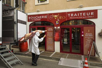 France, Gard, Aigues Mortes, delivery of a piece of meat to the bullfighting butcher