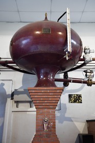 France, Calvados, Pays d'Auge, Le Breuil en Auge, Chateau du Breuil producer of Calvados AOC Pays d'Auge, distillery, alembic with tanks of cognac type