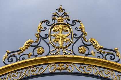 France, Gard, Nimes, wrought iron gate gilded with gold at the entrance to the Jardins de la Fontaine
