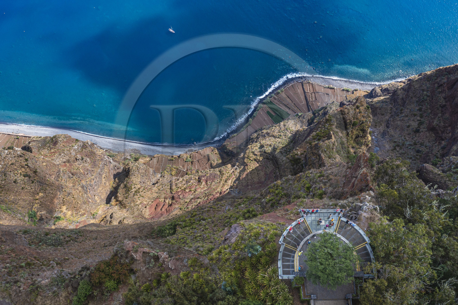 Portugal, Madeira Island, Camara de Lobos, the Cap Girao belvedere, a glass platform overlooking the second highest cliff in the world at 589 meters high, cultivated fields at the foot of the cliff (aerial view)