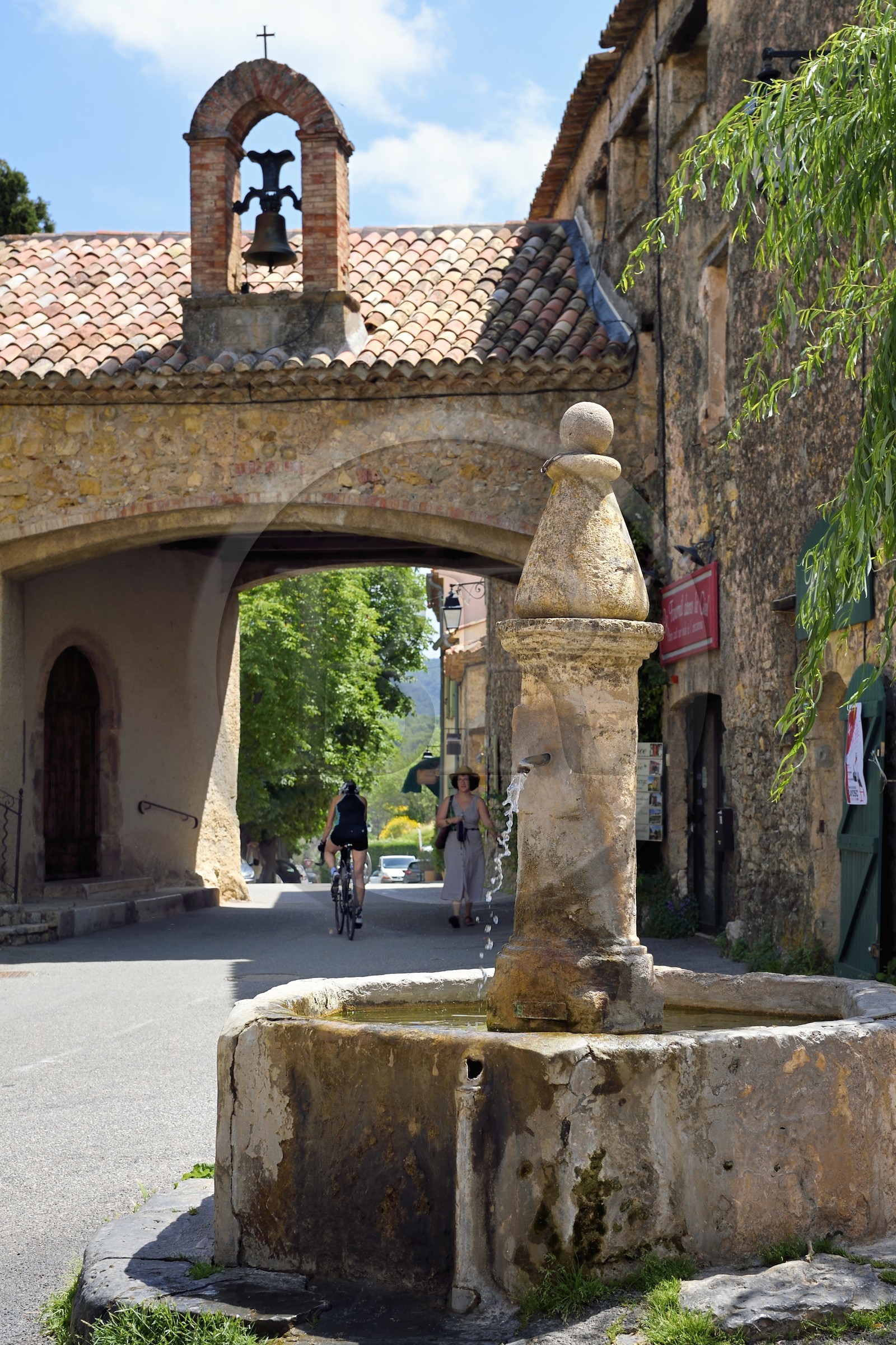 France, Var, the Dracenie, village de Tourtour, labelled Les Plus Beaux Villages de France (The Most Beautiful Villages of France), the East door of village and it's fountain
