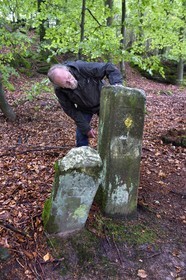 France, Bas-Rhin, Parc regional des Vosges du nord (Northern Vosges Regional Natural Park), La Petite Pierre, boundary stones dating from 1674, the guide and storyteller Georges Gerlinger