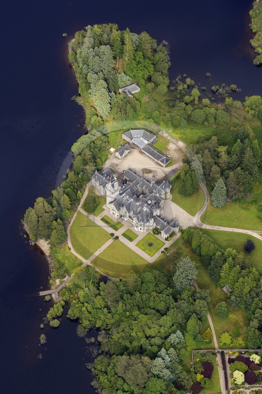 United Kingdom, Scotland, Highland, Lochaber district, Ardverikie Castle built in the Scottish baronial style in 1870 on the shores of Loch Laggan (aerial view)