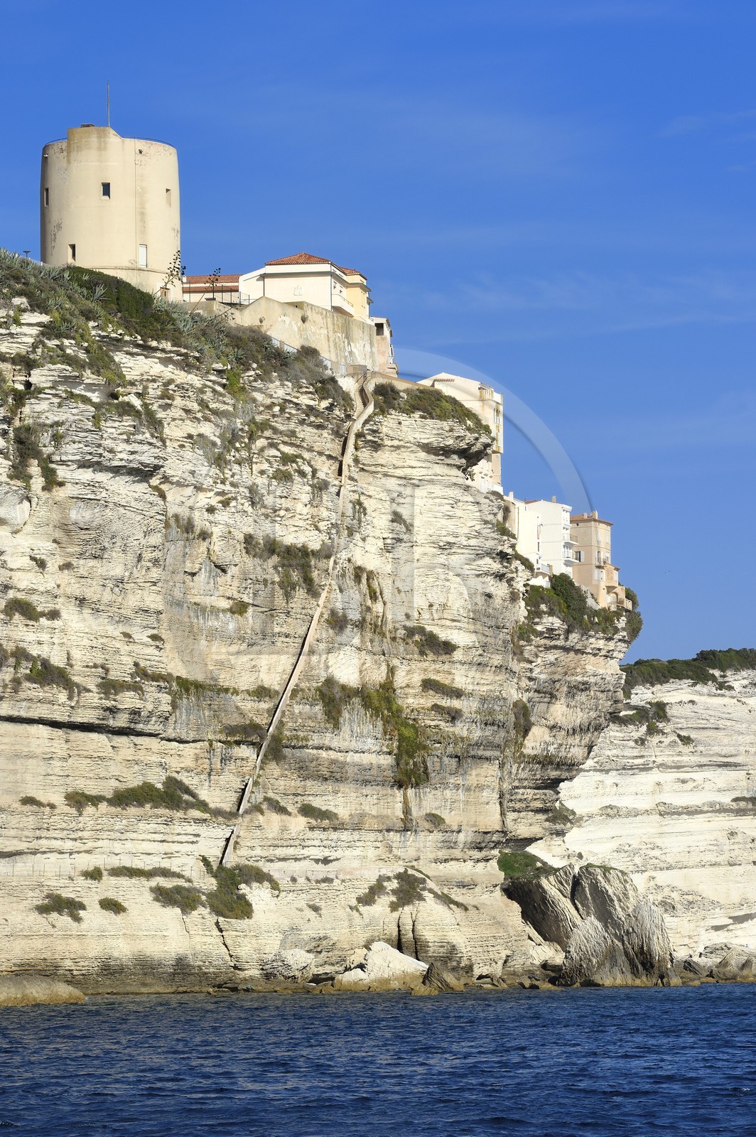 France, Corse du Sud, Bonifacio, the staircase of the King of Aragon sculpted in the limestone cliffs and the the dungeon