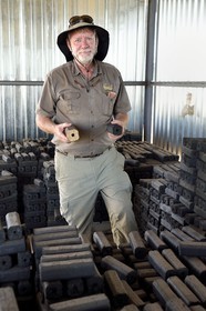 Namibia, Otjiwarongo, Cheetah Conservation Fund, research and education centre, CCF BUSH Pty Ltd manufactures wood fuel briquettes as a pilot project to explore a strategy to improve habitat for cheetah by removal of thickened bush, Bruce Brewer PhD. General Manager and also runs the CCF Bushblok project