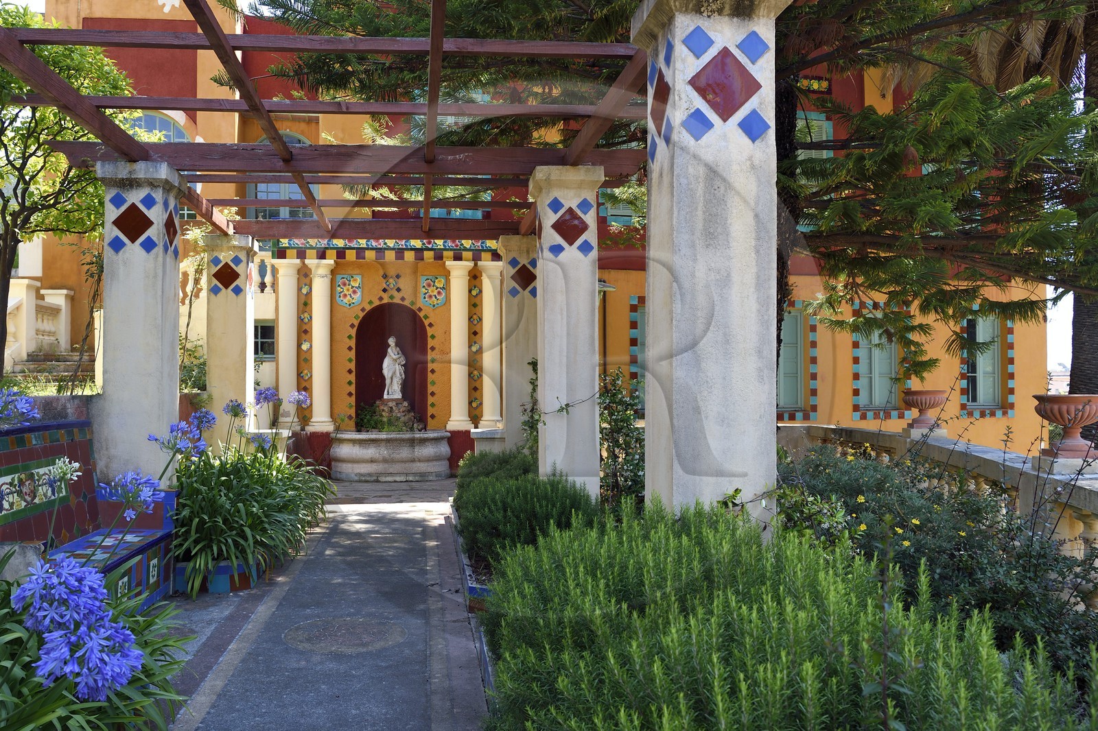 France, Alpes-Maritimes, Menton, Fontana Rosa Garden, elevated villa decorated with ceramics, including the library and the writer's personal cinema, pillared terrace