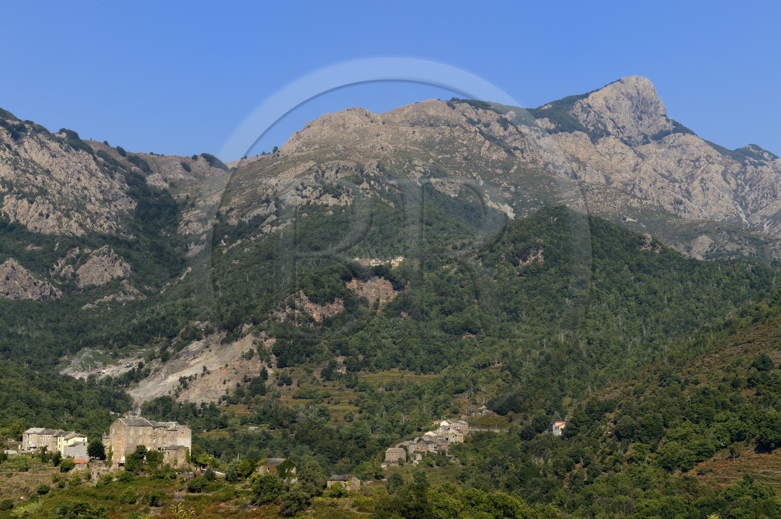 France, Haute Corse, Castagniccia, the village of Piedipartino and Pie d'Orezza in second plan at the foot of mount San Petrone