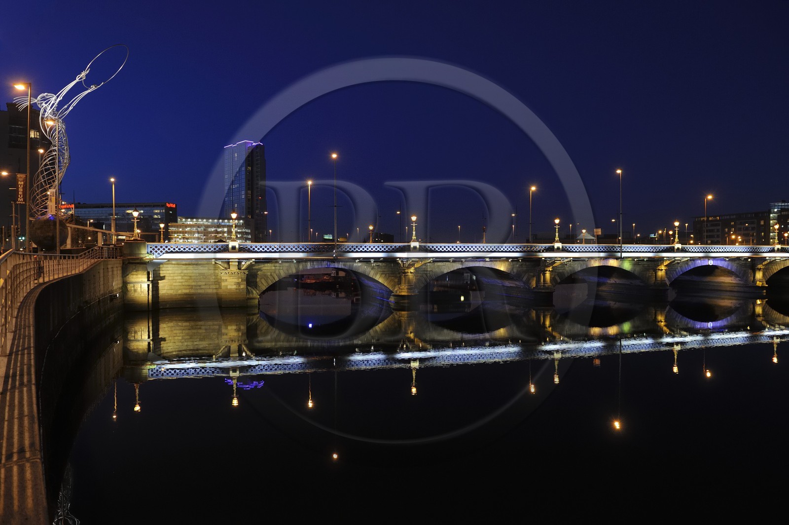 United Kingdom, Northern Ireland, Belfast, the waterfront on the Lagan riverside, Queens Bridge, Beacon of Hope is art metal sculpture by Andy Scott 19.5 metres high constructed in 2007 in Thanksgiving Square and the tallest skyscraper in Ireland Obel Tower