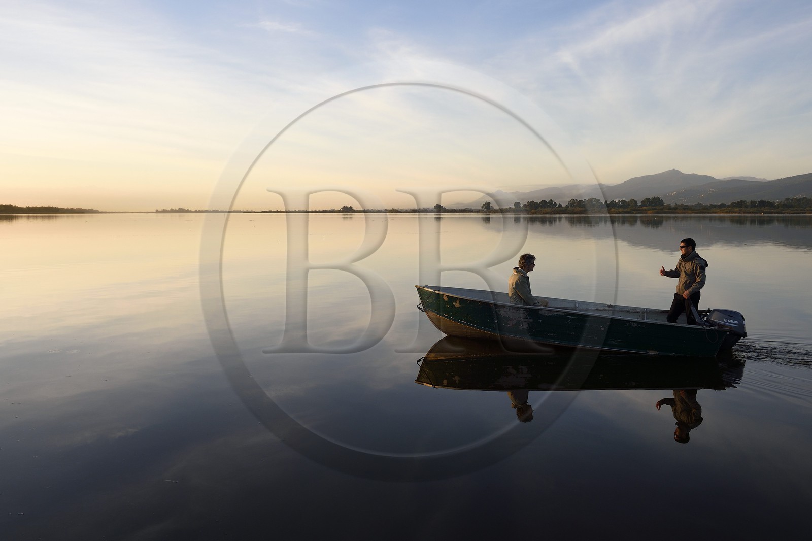 France, Haute Corse, the pond of Biguglia (Stagnu di Chiurlinu) at dawn, nature reserve of Corsica (RNC), Paul-Marie Ghipponi guard of the natural reserve of Corsica (RNC) patrolling the pond